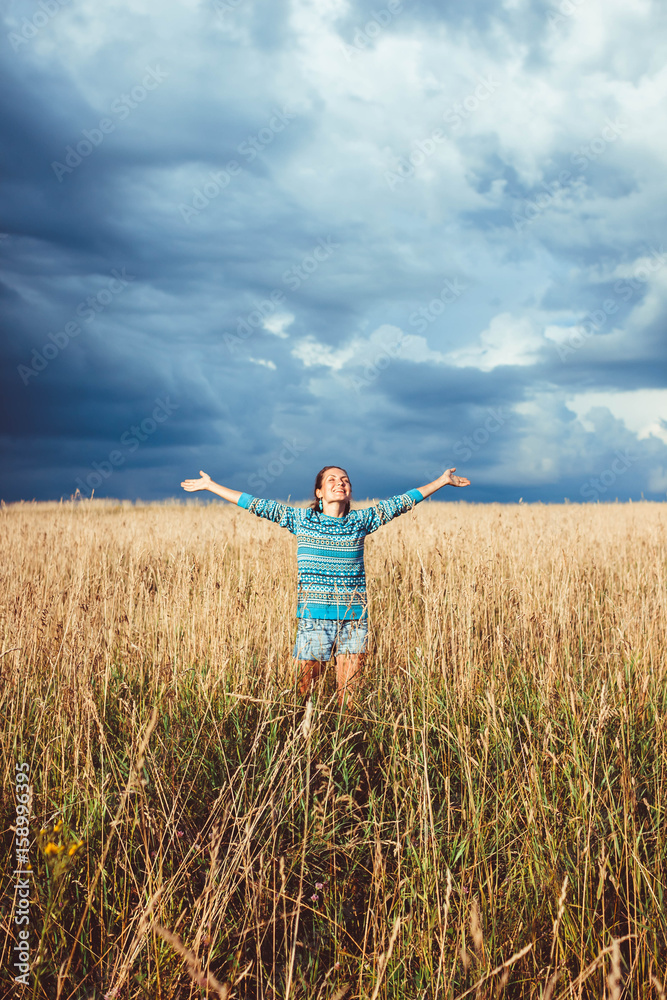 A woman in a rye field A woman in a rye field