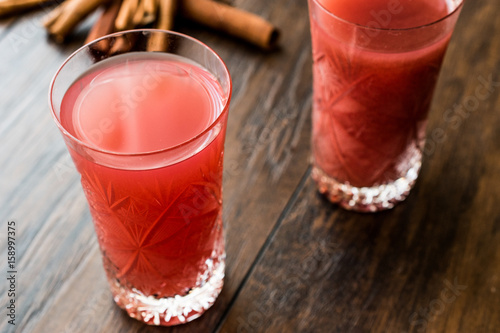 Kizilcik serbeti / Cranberry Sherbet with cinnamon sticks. photo