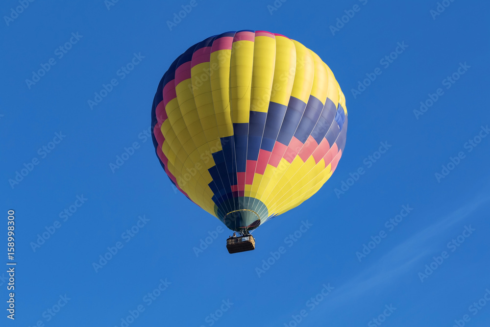 Balloon floats above California winery vineyard Balloon floats above California winery vineyard