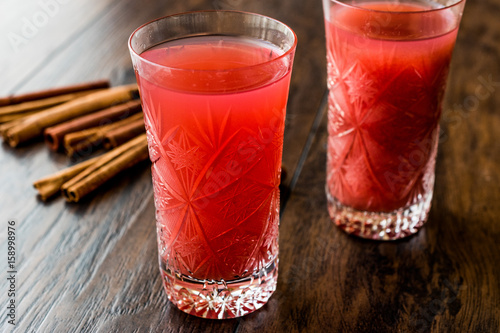 Kizilcik serbeti / Cranberry Sherbet with cinnamon sticks. photo