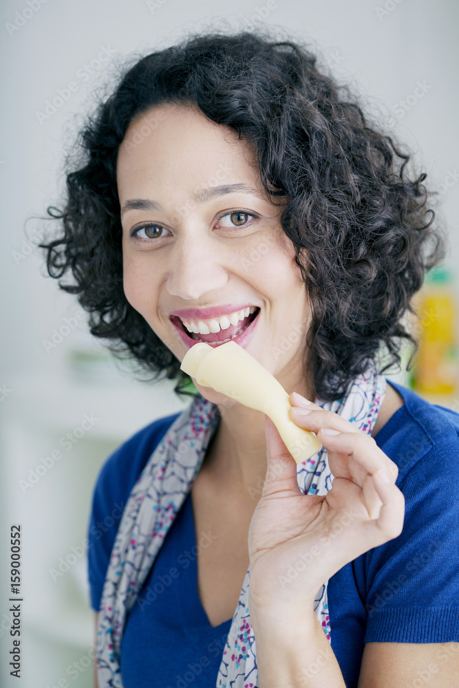 Woman eating cheese