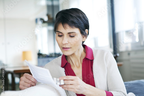 Woman taking medication