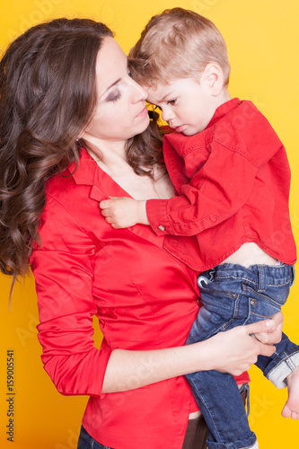 mother and son in red shirts photo