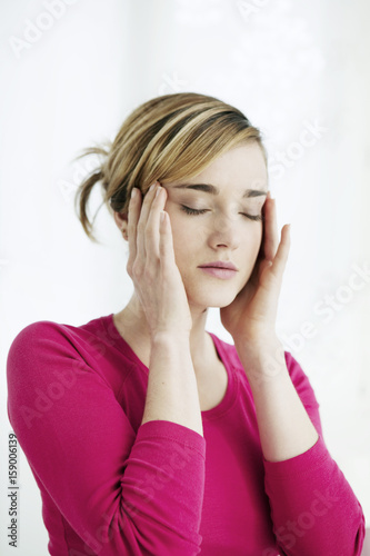 Woman with a migraine