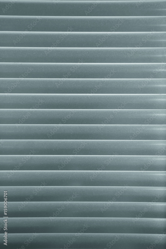 Horizontal pattern of purple venetian blinds Horizontal pattern of purple venetian blinds