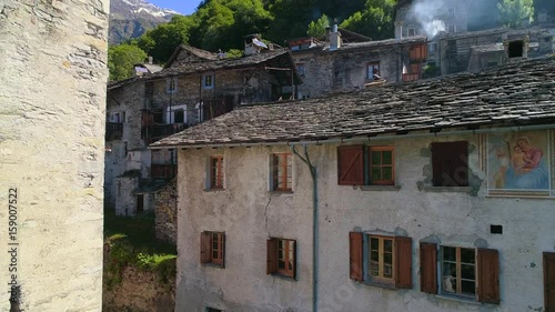 Aerial 4K - Savogno - Antico borgo della Val Bregaglia (IT)  photo