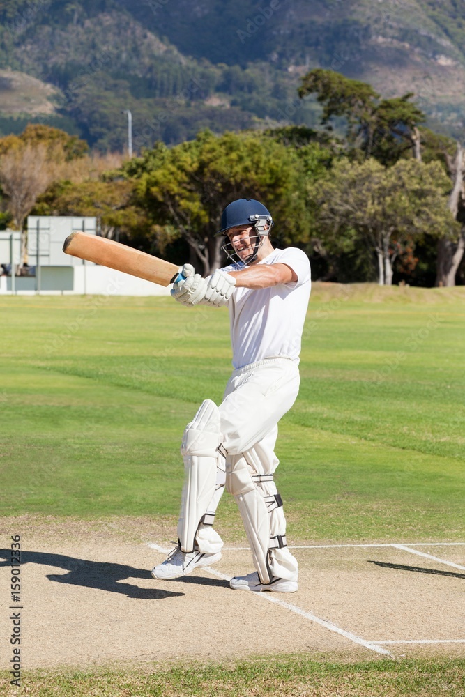 Batsman playing cricket at field Batsman playing cricket at field