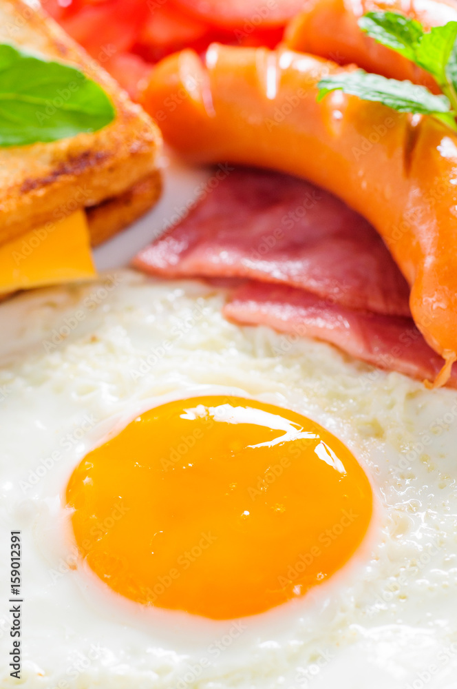 breakfast with sausage fried egg and orange juice breakfast with sausage fried egg and orange juice