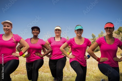 Group of women exercising together in the boot camp
