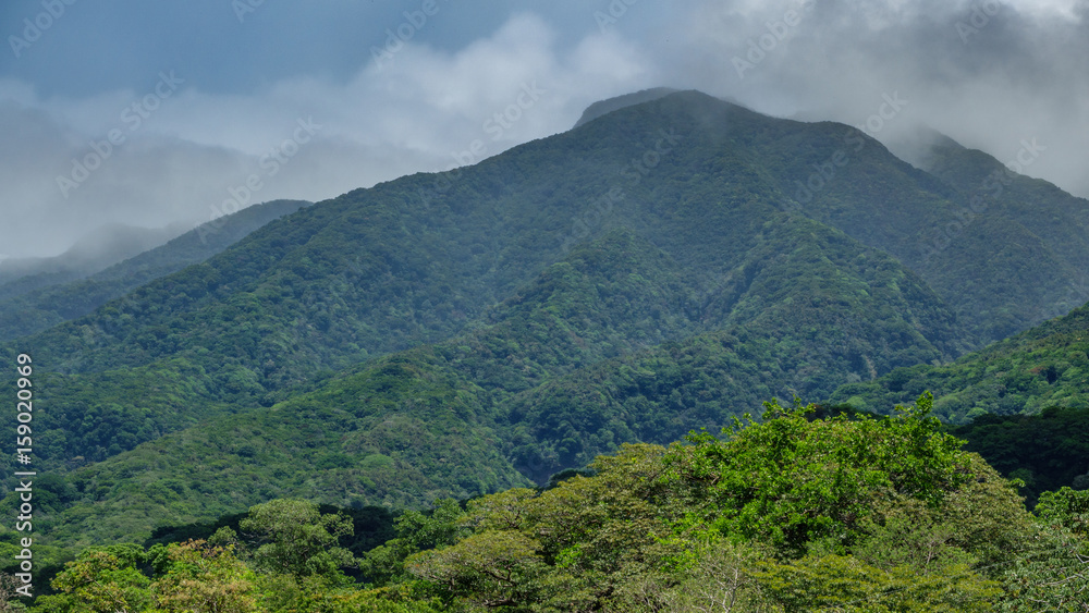 Rincon de la vieja vulcano and misty clouds