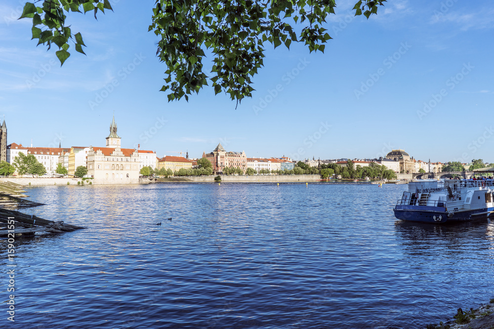 View of the Liechtenstein Palace and Vltava river from the shore of Stare Mesto in Prague