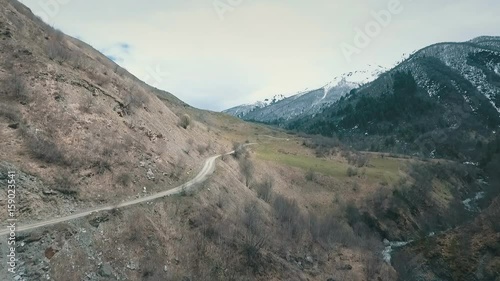 winding road in mountains,mountains in background,shooting with the drone photo