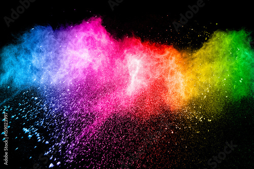 color powder explosion on black background. Mauve color cloud. color dust explode. Freeze motion paint Holi. © Pattadis