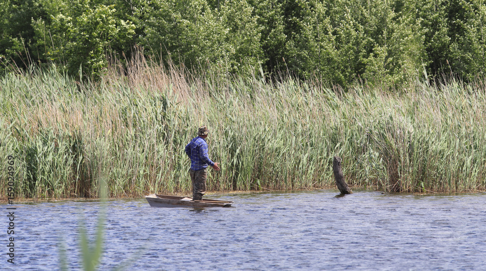 A brave fisherman, in an unacceptably small boat, talking to himself ... A brave fisherman, in an unacceptably small boat, talking to himself ...