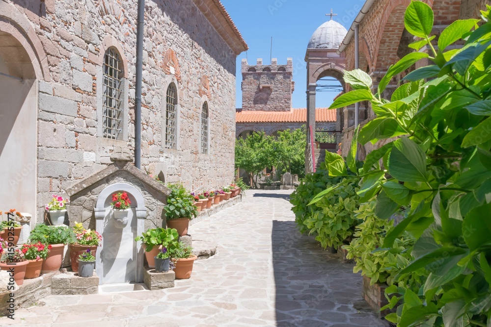 The courtyard of the famous Moni Agiou Ioanni monastery Theotokou Ipsilou on the Greek island of Lesbos in the Aegean Sea.