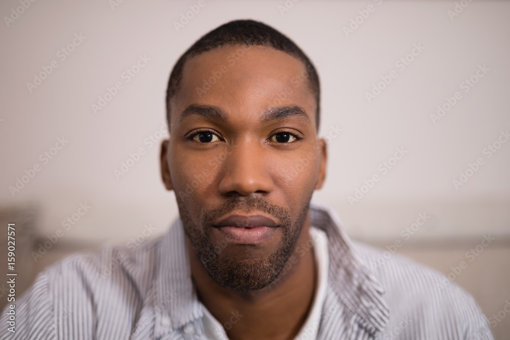 Obraz premium Portrait of confident young man at home