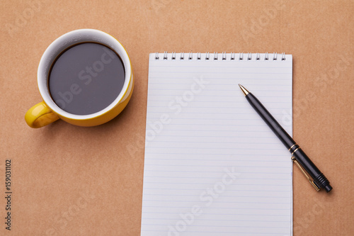 cup of coffee on the office table photo