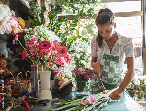 Florist working in her flower shop