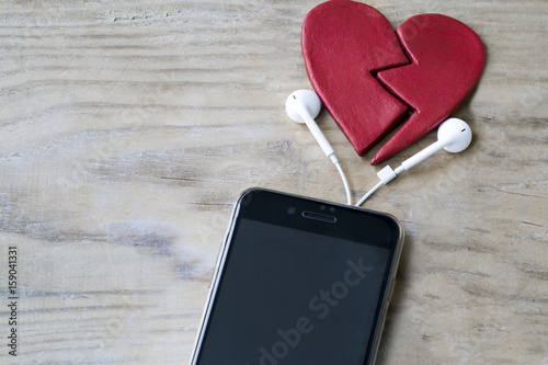 Mobile Phone, Headset and Divorce Heart photo