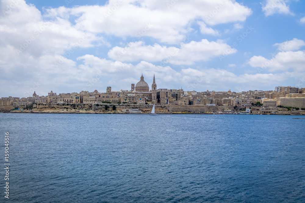 Valletta skyline from Sliema with Basilica of Our Lady of Mount Carmel - Valletta, Malta Valletta skyline from Sliema with Basilica of Our Lady of Mount Carmel - Valletta, Malta