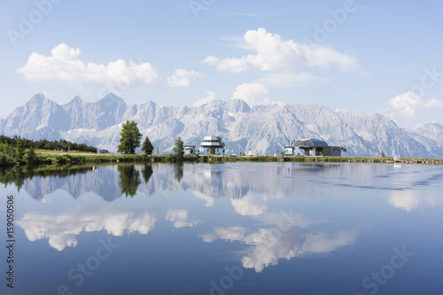 Lake with mountain Dachstein on Reiteralm, austria photo