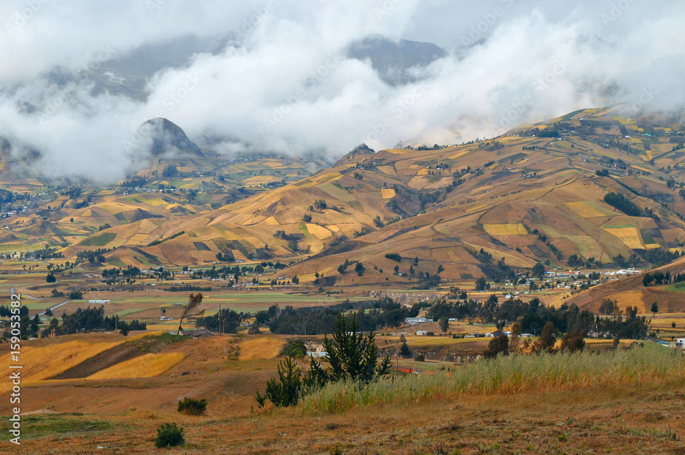Clouds on the fields of Zumbahua in Ecuadorian Altiplano. Highland Andes near Quilotoa lagoon, South America Clouds on the fields of Zumbahua in Ecuadorian Altiplano. Highland Andes near Quilotoa lagoon, South America
