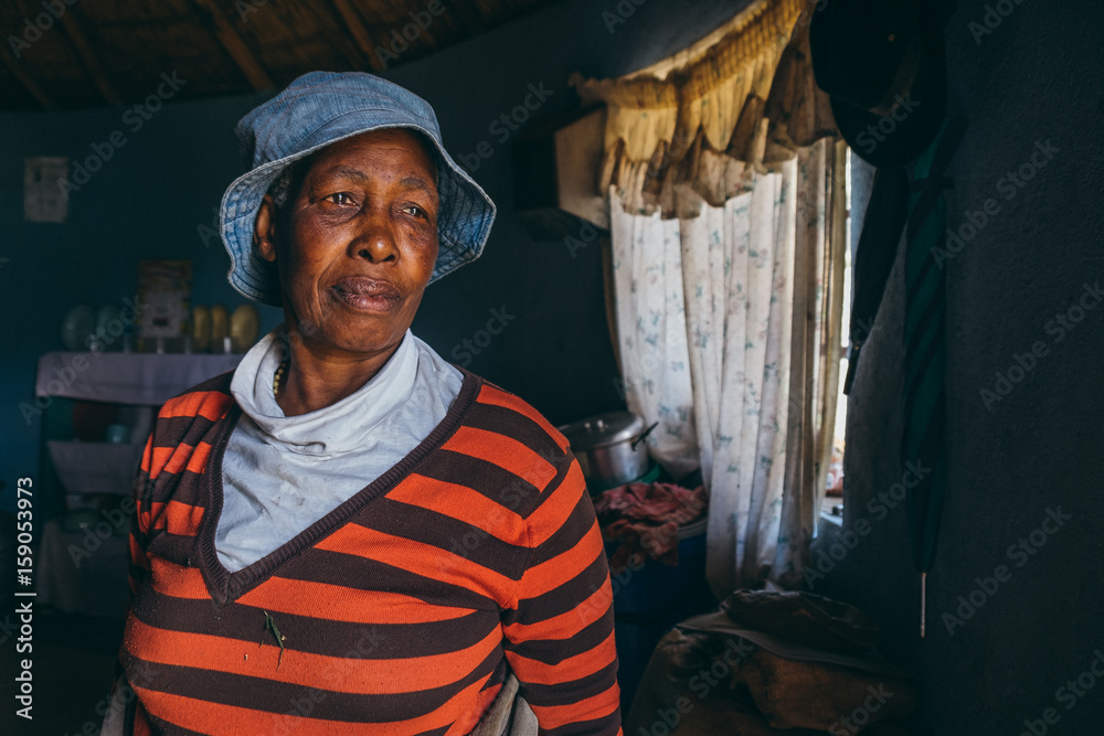 portrait of a Basotho woman in her home portrait of a Basotho woman in her home