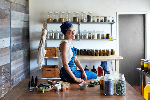 Millennial African American Woman Maker in Her Studio photo
