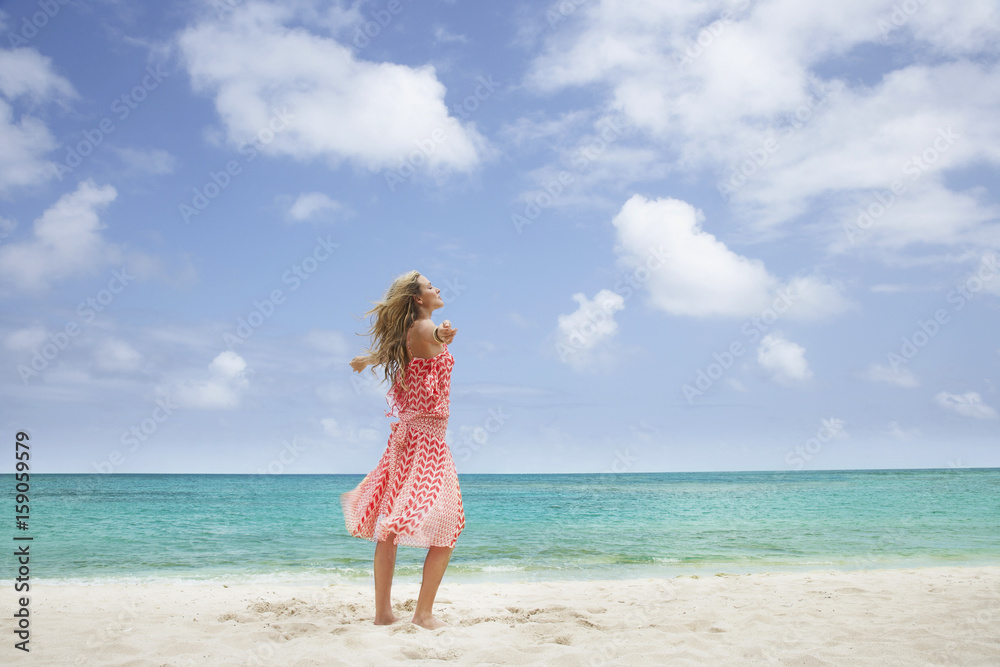 Beautiful woman relaxing on beach Beautiful woman relaxing on beach