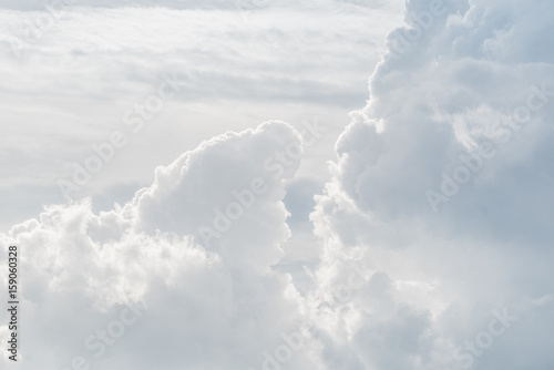 White sky and puffy cloud.