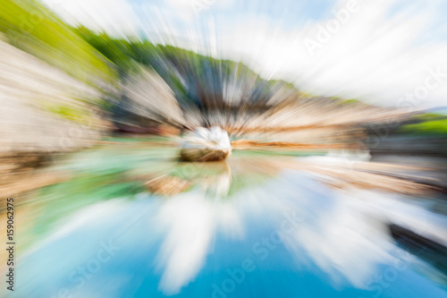 Zoom blur abstract images at Limu Pools stunning vibrant colors of coral pools and surrounding coral formations in Niue. photo