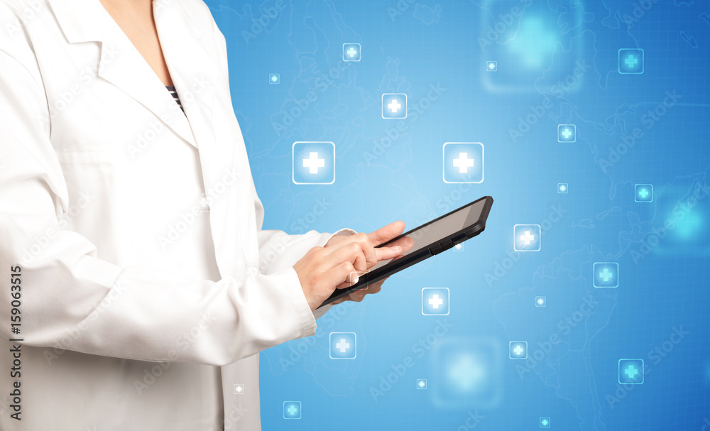 Female doctor with tablet Female doctor with tablet