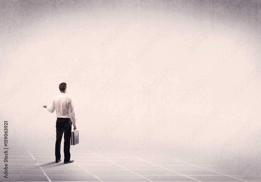 Business person standing in empty space Business person standing in empty space