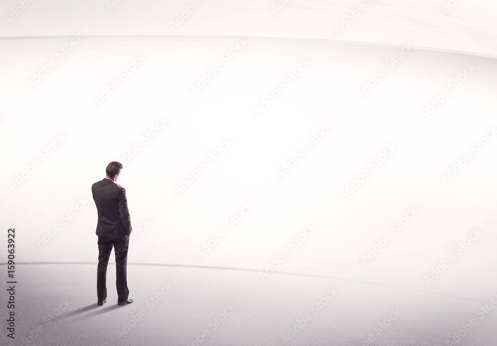 Businessman with briefcase standing still Businessman with briefcase standing still
