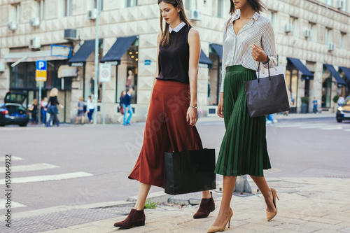 Women Walking on City Street