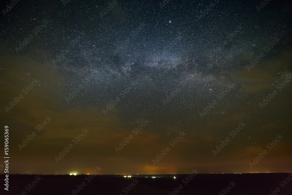 Galaxy Milky Way with clouds in the night sky