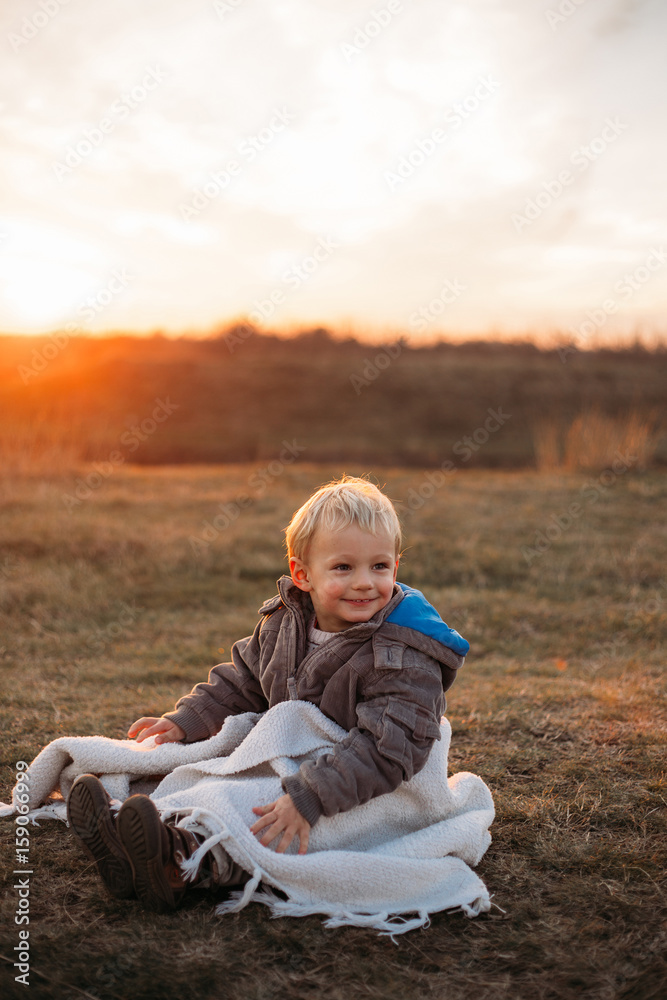 Portrait of a kid covered with white blanket Portrait of a kid covered with white blanket