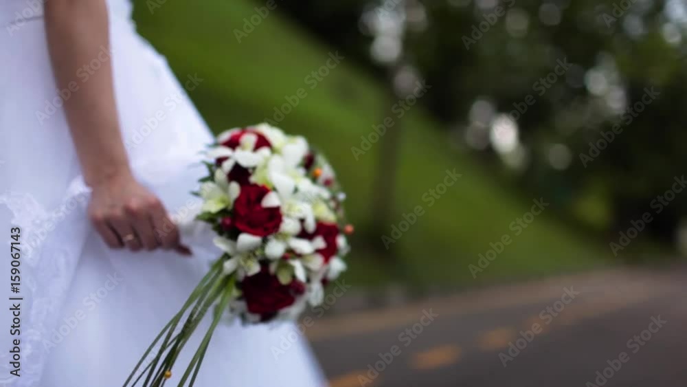 the bride in carrying the Bridal bouquet the bride in carrying the Bridal bouquet