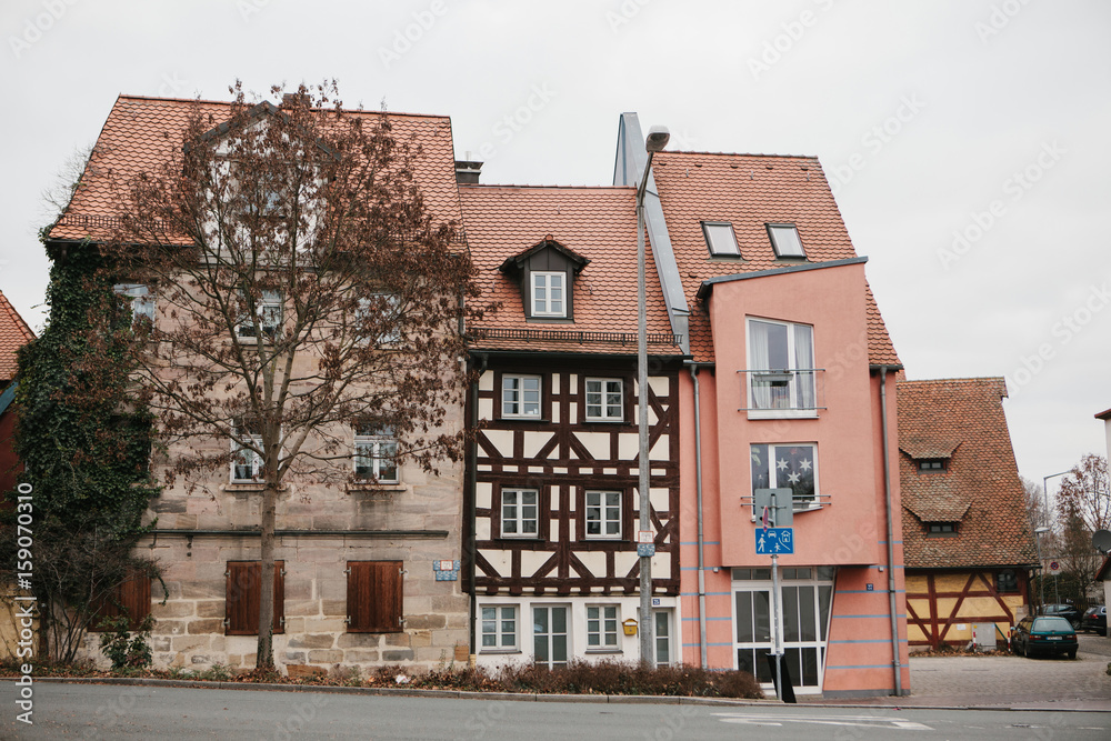 Traditional house in the German style in Bavaria. The architecture of houses in Germany.