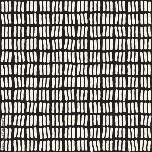 Hand drawn style ethnic seamless pattern. Abstract geometric tiling background in black and white. Vector freehand doodle texture.
