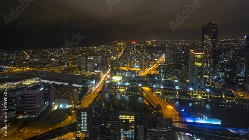 Wallpaper Mural 4k Time lapse Night scene at Melbourne CBD cityscape skyline with motion blur traffic light trail. Pan left Torontodigital.ca