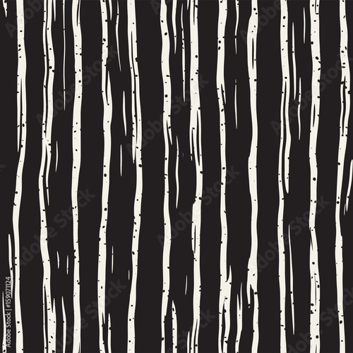 Decorative seamless pattern with hand drawn doodle lines. Hand painted grungy wavy stripes background. Trendy freehand texture
