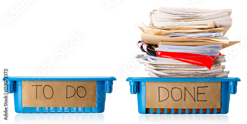 An empty To Do Tray and a full Done tray - Up to Date - Current - On top of things - Productive - Isolated on white background
