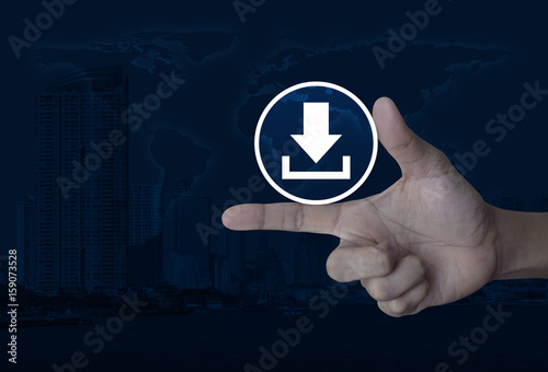 Download icon on finger over world map and modern city tower, Business internet concept, Elements of this image furnished by NASA