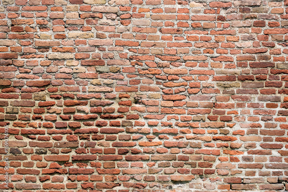 Naklejka premium Old red brick wall texture background