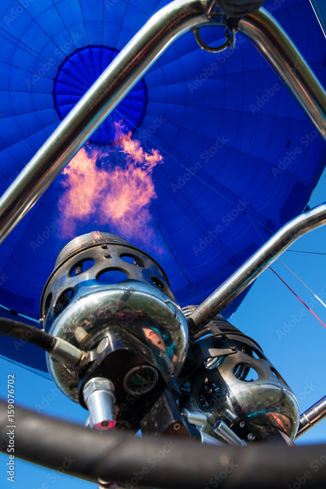 Fototapeta premium blower and inside of a blue hot- air balloon