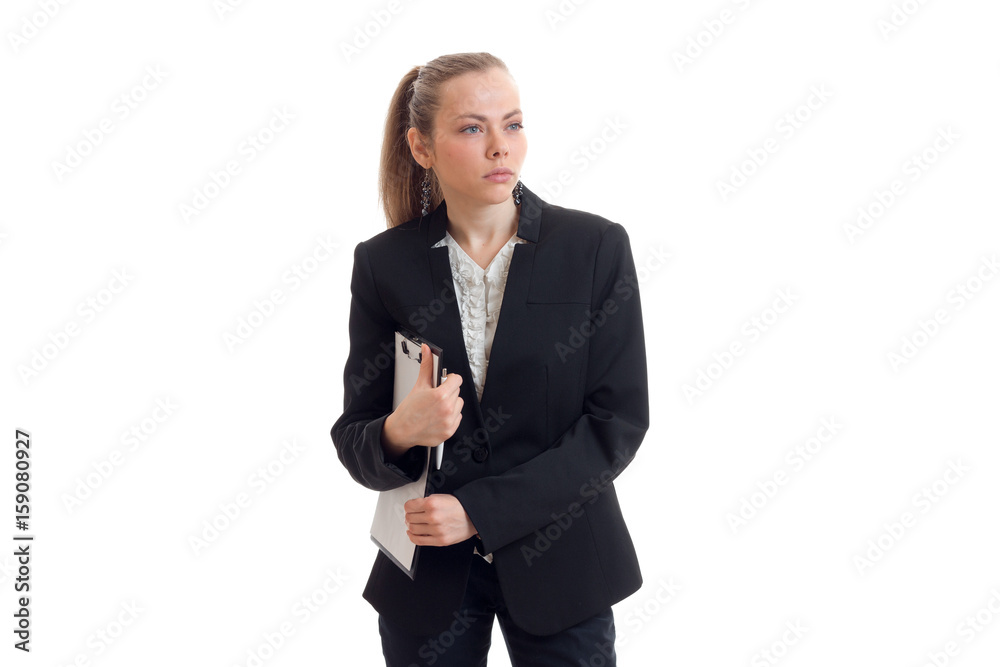 young sexy business Lady in black suit holding a Tablet and looks toward young sexy business Lady in black suit holding a Tablet and looks toward