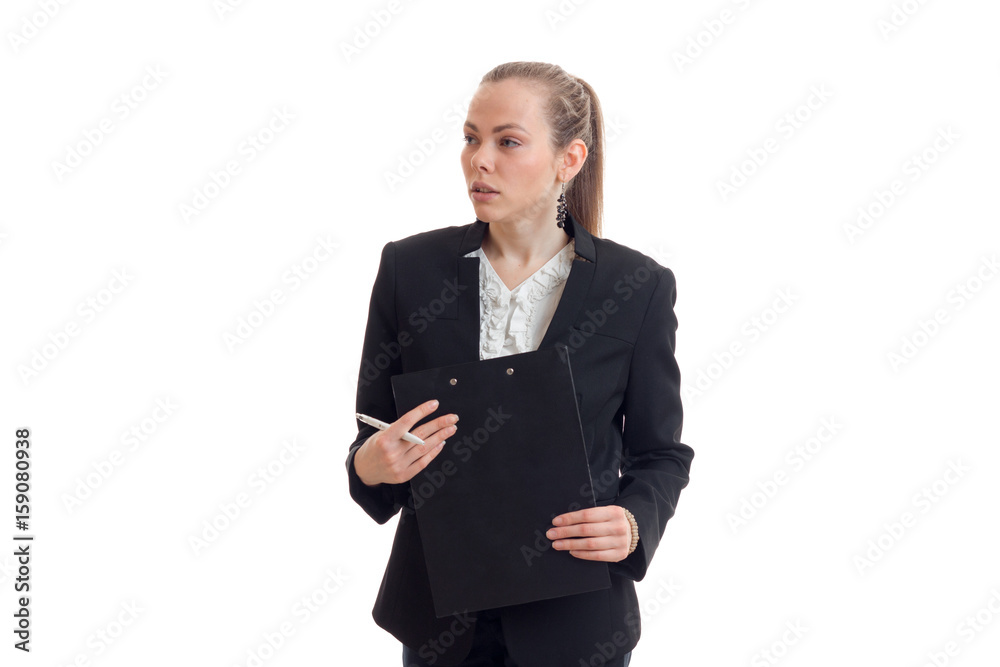 beautiful young blonde in a black business suit holding a Tablet beautiful young blonde in a black business suit holding a Tablet