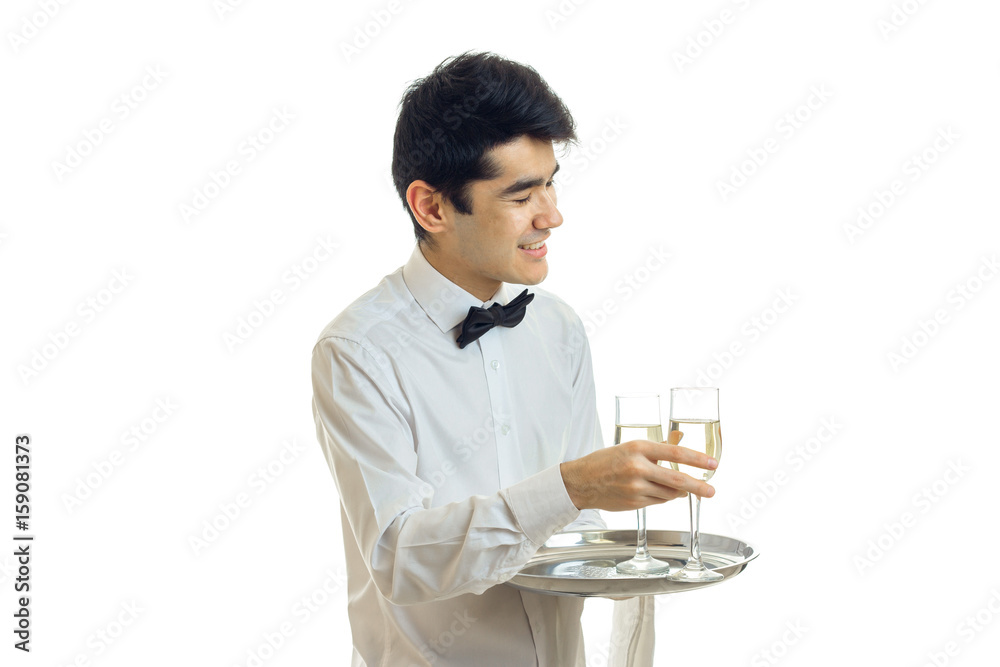 smiling lovely waiter takes a glass of wine with a tray smiling lovely waiter takes a glass of wine with a tray