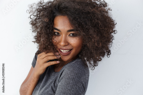Close up lifestyle portrait curles hair ethnic brasilian hispanic model 